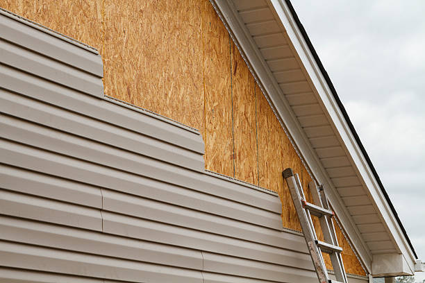 Professional Siding Replacement technician working in Bethesda, MD